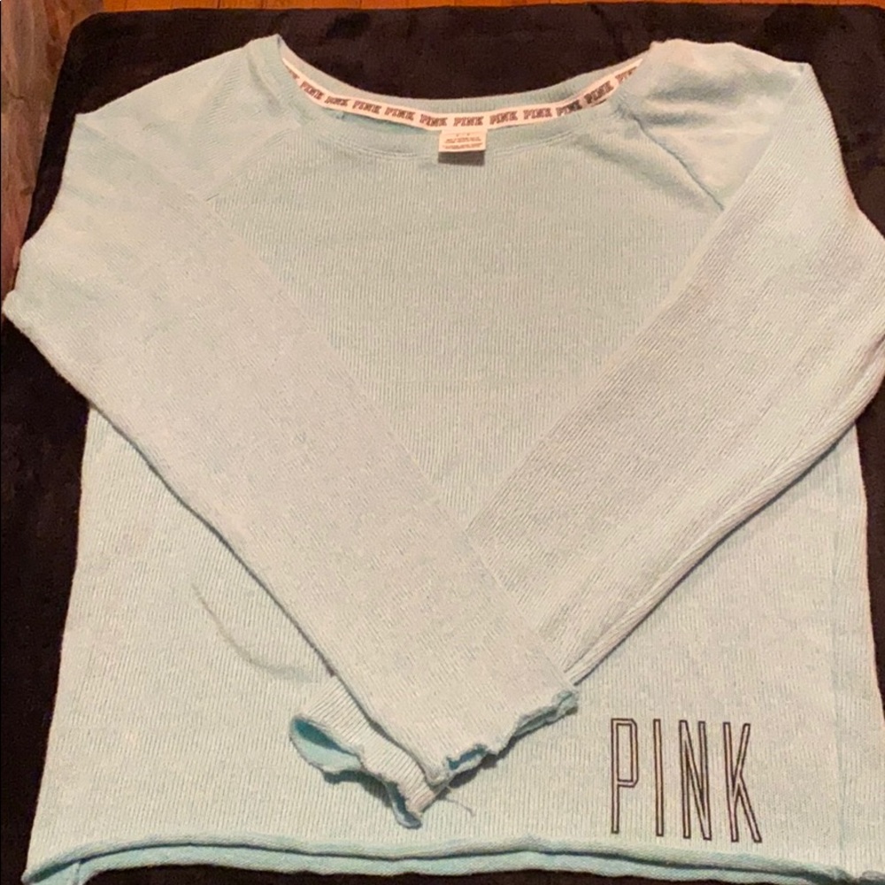 Lady’s pink Victoria’s Secret sweater